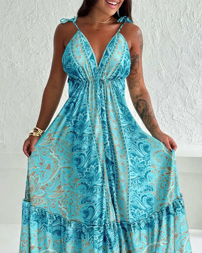 Vestido Feminino 2025 – Primavera/Verão, Última Moda, Estampa Floral, Decote V, Amarração, Alças Finas, Maxi Dress, Casual, Modelo A-Line com Saia Longa Franzida