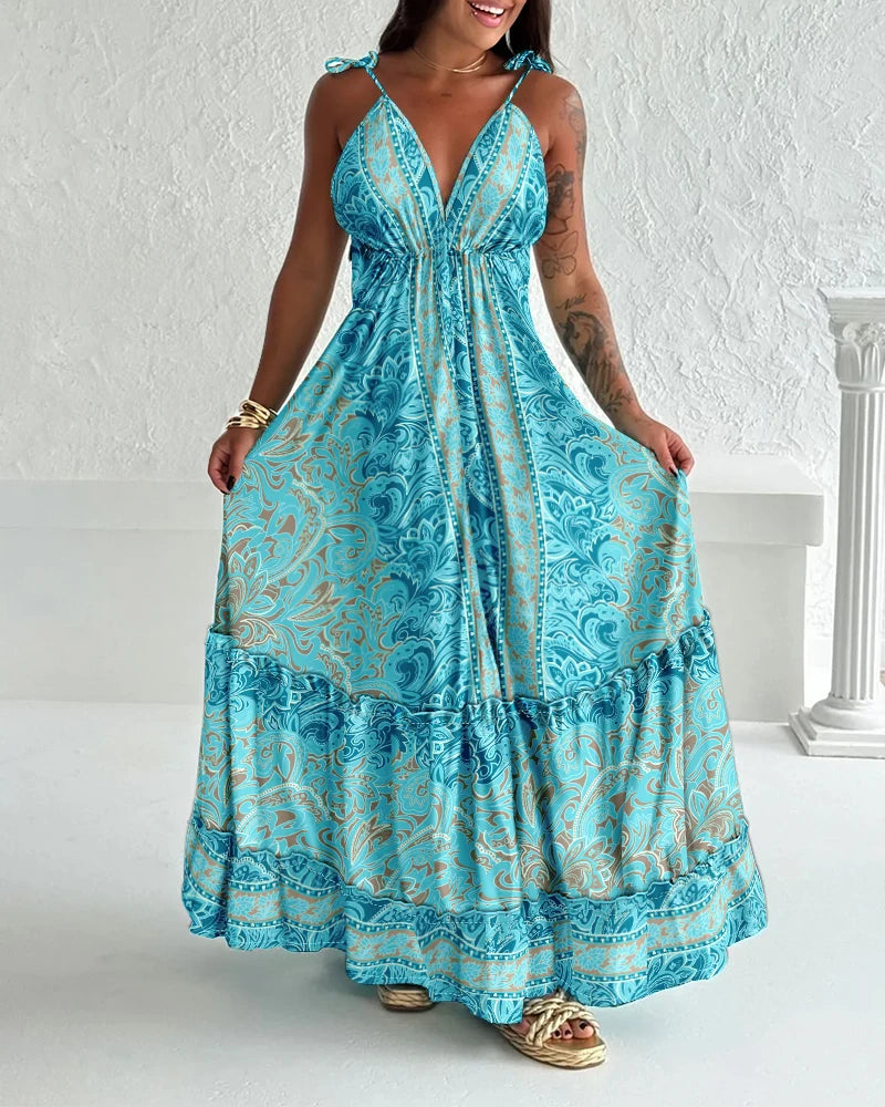 Vestido Feminino 2025 – Primavera/Verão, Última Moda, Estampa Floral, Decote V, Amarração, Alças Finas, Maxi Dress, Casual, Modelo A-Line com Saia Longa Franzida